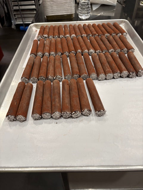 Chocolate cigars filled with silky ganache - Box of 8